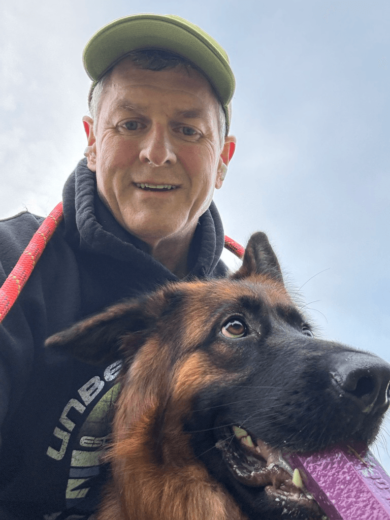 Joe Egan with his German Shepherd